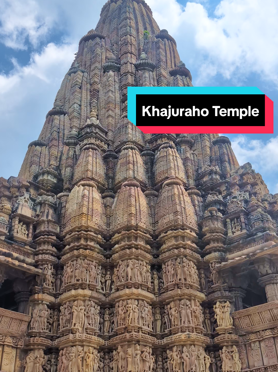 The Khajuraho temples, built between the 9th and 11th centuries under the Chandela dynasty, stand as one of India’s greatest architectural legacies. Carved from sandstone, the temples are celebrated for their intricate sculptures, which cover nearly every surface with depictions of gods, celestial beings, musicians, dancers, warriors, and lovers. Rising on high platforms, their towering shikharas (spires) mimic the peaks of the Himalayas, symbolizing the cosmic mountain Meru. Although only about twenty temples survive of the original eighty-five, they reveal a sophisticated blend of devotion, artistry, and engineering. The sculptures range from deeply spiritual portrayals of Hindu deities like Shiva, Vishnu, and Devi, to the famed erotic carvings which illustrate themes of desire, fertility, and the celebration of life. These images were not merely decorative but reflected broader philosophies of the period—where the sensual and the sacred were intertwined as paths toward divine understanding. Design follows the nagara style of North Indian temple architecture, with mandapas (pillared halls), sanctums, and elaborate projections, all arranged in precise alignment with cosmological principles. Today, the Khajuraho temples—recognized as a UNESCO World Heritage Site—offer not only a glimpse into the artistry of medieval India but also into the spiritual imagination of a culture that saw no division between earthly and divine experience. #Khajuraho  #AncientIndia  #AncientTemple  #IndianHistory  #AncientHistory 