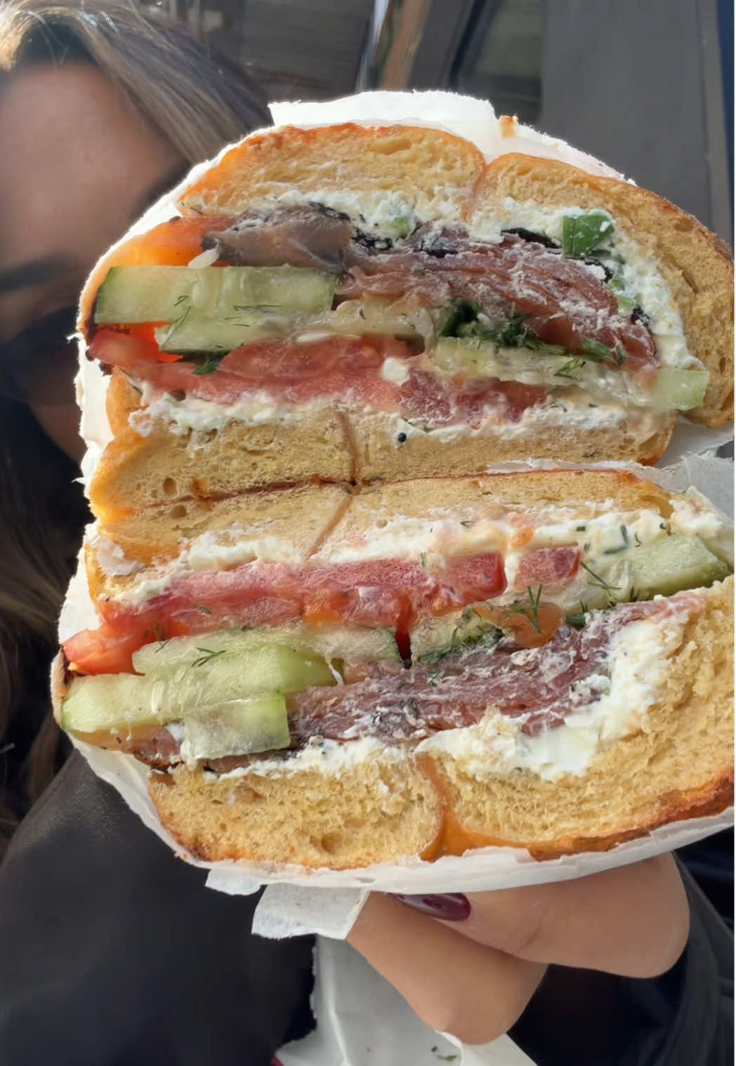 First stop off the plane @Tompkins Square Bagels this time the UES location! I got a pumpkin bagel, scooped and toasted, with scallion, cream cheese, pastrami lox,  cucumber, tomato, and dill. ##nyceats##bagel##lox