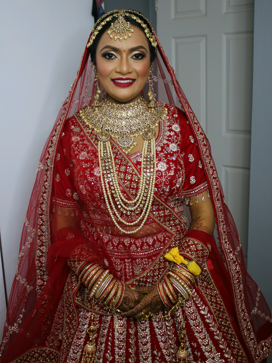Captivating in Bridal Red ♥️  Full dressing on the beautiful Trisha 🌸 #amitmakeupartistry #bridal #desi #lehenga