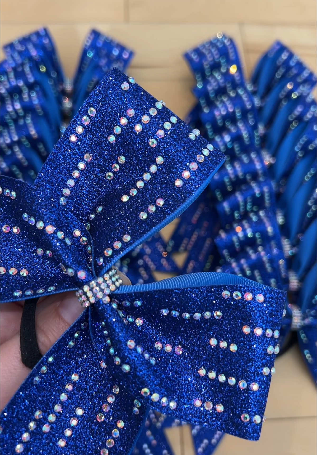 Such a cute play on collegiate bows💙🥰 #cheerbowbusiness #cheerbowtok #cheerleading #smallbiz #shopsmall 