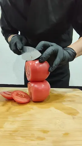 One slice. Two tomatoes. Zero effort. 🍅 This Japanese knife turns every cut into art—sharpness, balance, and power all in your hands. Ready to transform your kitchen game?” #CustomKnives #KitchenMagic #CookingTok #SharpTools #ChefLife #JapaneseKnife 
