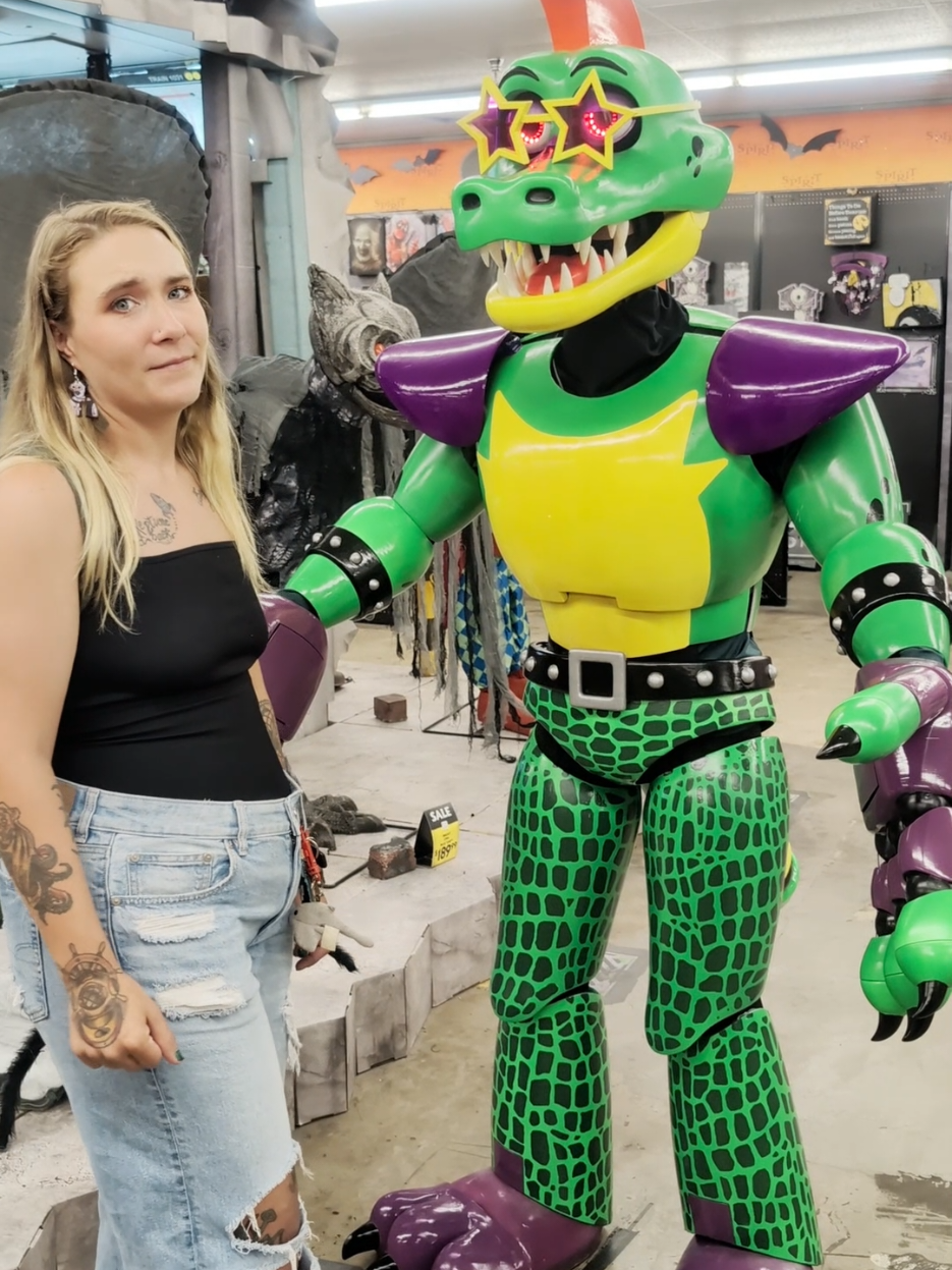 Monty Gator is a fair price I think 😅 Freddy Fazbear Entertainment is really keen on offloading some of their more... aggressive... animatronics. @Spirit Halloween Spirit of Halloween took over the old Freddy's Pizza Place and opened up a costume store. Montgomery Gator is reasonably priced I think! we had some fun taking photos and video at our local Spirit of Halloween! the staff were also amazing and welcoming to our Pizzaplex cast walking around the store. more videos to come, this one made me laugh! Love the Five Nights at Freddy's and Security Breach merch. #fnaf #fivenightsatfreddys #cosplay #halloween #fnafsb 