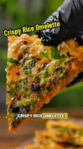 Crispy rice, eggs, and a nice chili crisp kick 😋 There’s just something so satisfying about biting into one of these! If you have left over rice, this is one of the best ways I’ve found to bring new life into it without just making fried rice. I like to top mine with a little chili crisp, but you can get WAY more creative if you want with things like sliced avocado, steak, veggies, etc. Next time, I was thinking I might mix some gochujang into the rice to give it a little more flavor, but it’s still delicious like this and takes less than 10 minutes to make. Would you try them? Let me know in the comments what you think if you do! 🙌 INGREDIENTS 1 tbsp chili oil 1 instant rice cup (7.1 oz) 3-4 eggs (beaten) furikake (to taste) 4 stalks scallions INSTRUCTIONS 1️⃣ If you’re using day old rice, skip step 1. If you’re using an instant rice cup, heat it in the microwave, and then spread it out in a thin layer over a sheet of parchment paper and set aside for 1 hour to dry it out. 2️⃣ Chop the scallions. In a pan over medium heat, add the chili oil and mix it with the rice. Use a silicone spatula to spread a thin, even layer of rice over the bottom of the pan. 3️⃣ Crack the eggs into a small bowl and whisk together well. Then, pour it over the top of the rice. If it’s uneven, use your spatula to spread it across the rice. 4️⃣ Sprinkle the furikake and the scallions evenly across the eggs. 5️⃣ Cover the pan with a lid and let it cook for 3-5 minutes or until the eggs are cooked through. 6️⃣ Slide your spatula along the edges to make sure the rice is not sticking to the pan, then lift and tilt the pan and slide the rice omelette onto a plate. Use a knife or a pizza cutter to cut it into triangular pieces. 7️⃣ Enjoy! #tiktokfoodie #breakfast #omelette #crispyrice #brunchideas 