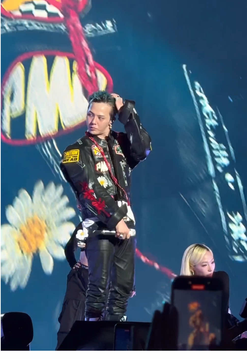 If looks could kill—G-Dragon stepping out in that DIY-ed racing jacket for the first night of the F1 Night Race weekend would do it. The unrivalled K-pop legend marked his return to Singapore for the first time in eight years with an exhilirating setlist that included all his hits, new and old. Starting from the riveting 'Power' and 'Home Sweet Home' openers to the swooping nostalgia of songs like 'Crayon', 'One of a Kind' and 'Crooked'. #VogueSingapore