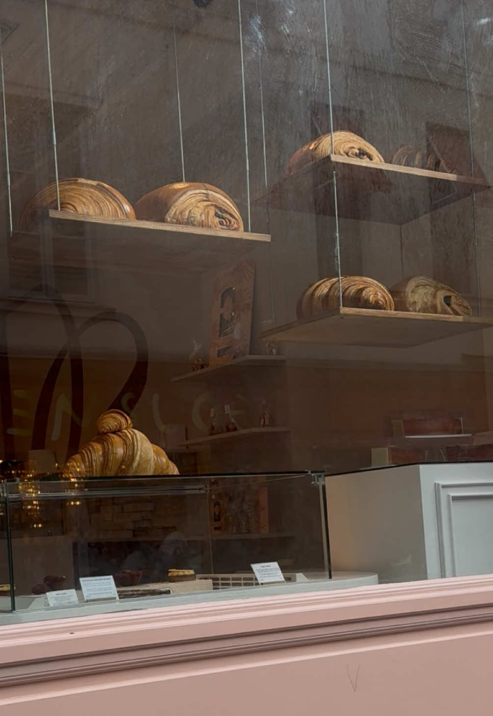 French croissants the size of a football helmet 🏈 WOW🥐 #paris #croissant #traveltiktok #kathleenmadigan #madiganspubcast 