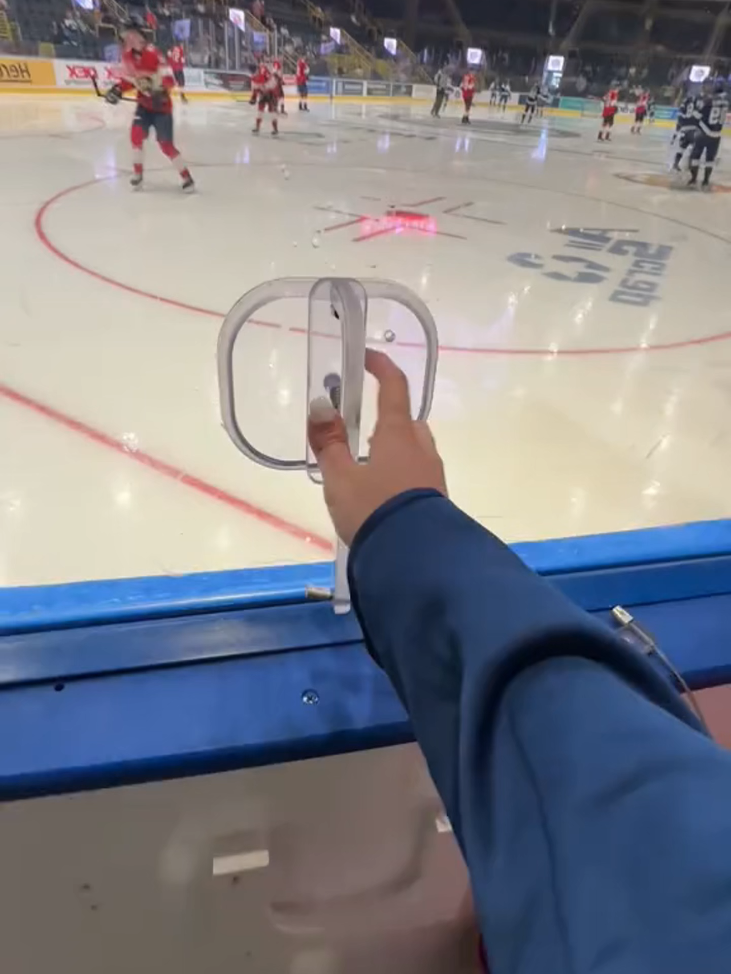 The holes in the ice hockey arena are a favorite of fans and photographers