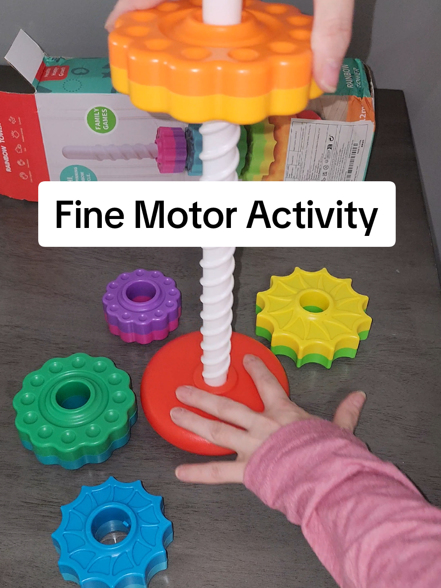 Fine motor activity for toddlers. This spinning rings set would make a great toddler gift.  rotating tower ring stack toy. #toddlergift #christmasgift #finemotortoy #tiktokshopfalldealsforyou #ringstackingtoy 