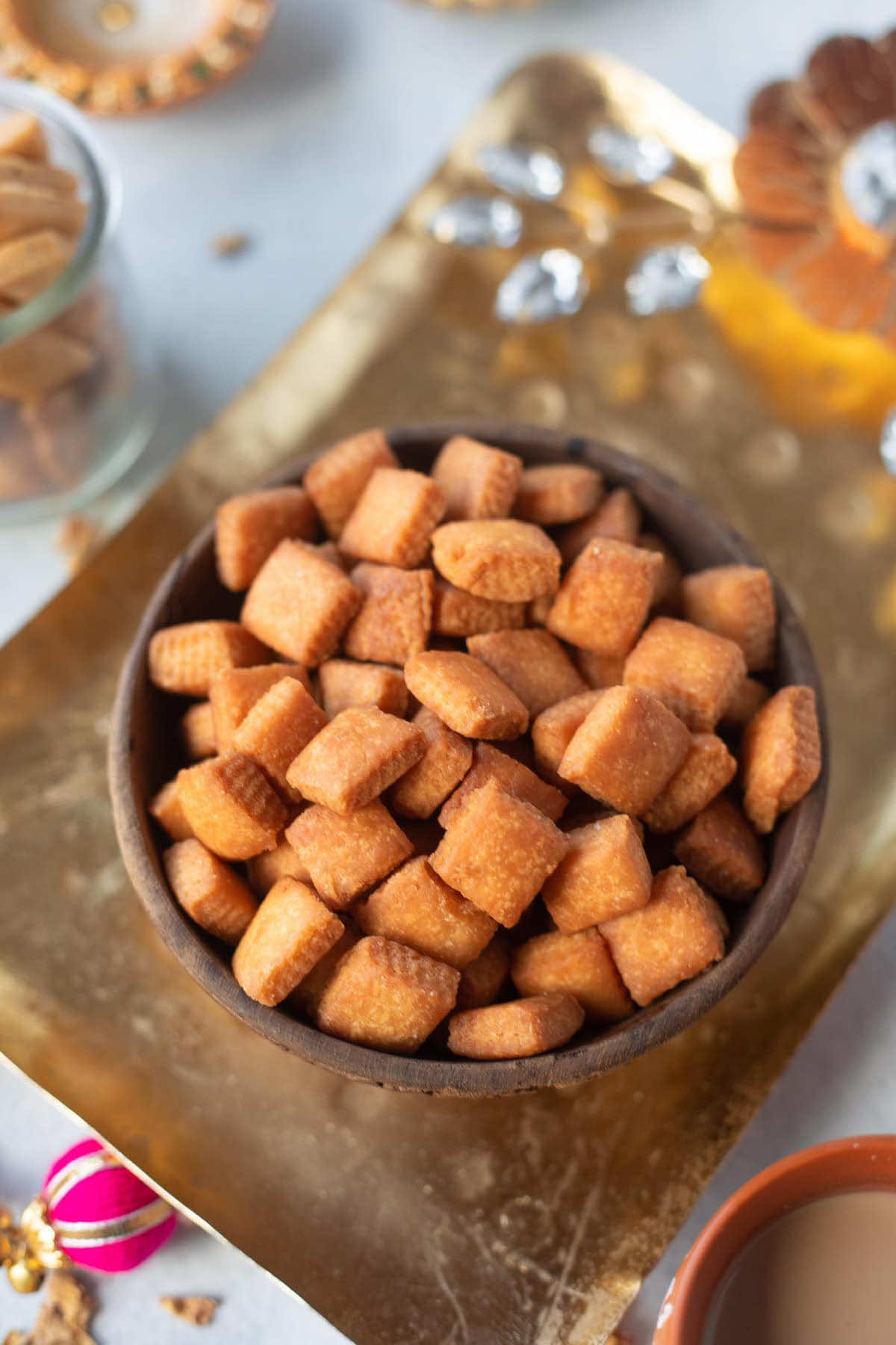 Warning: once you start munching, there’s no stopping! 😋✨ Sweet shakarpara, just like dadi used to make.  #FestiveSnacks #DiwaliReady