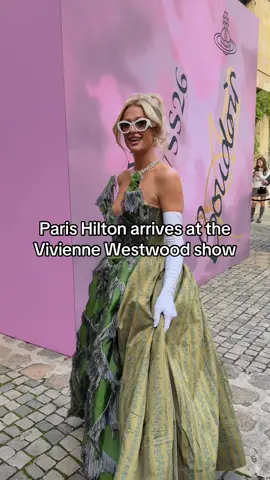 That’s hot. #ParisHilton arrives to the #VivienneWestwood spring 2026 show during #ParisFashionWeek, wearing a look from the house. 