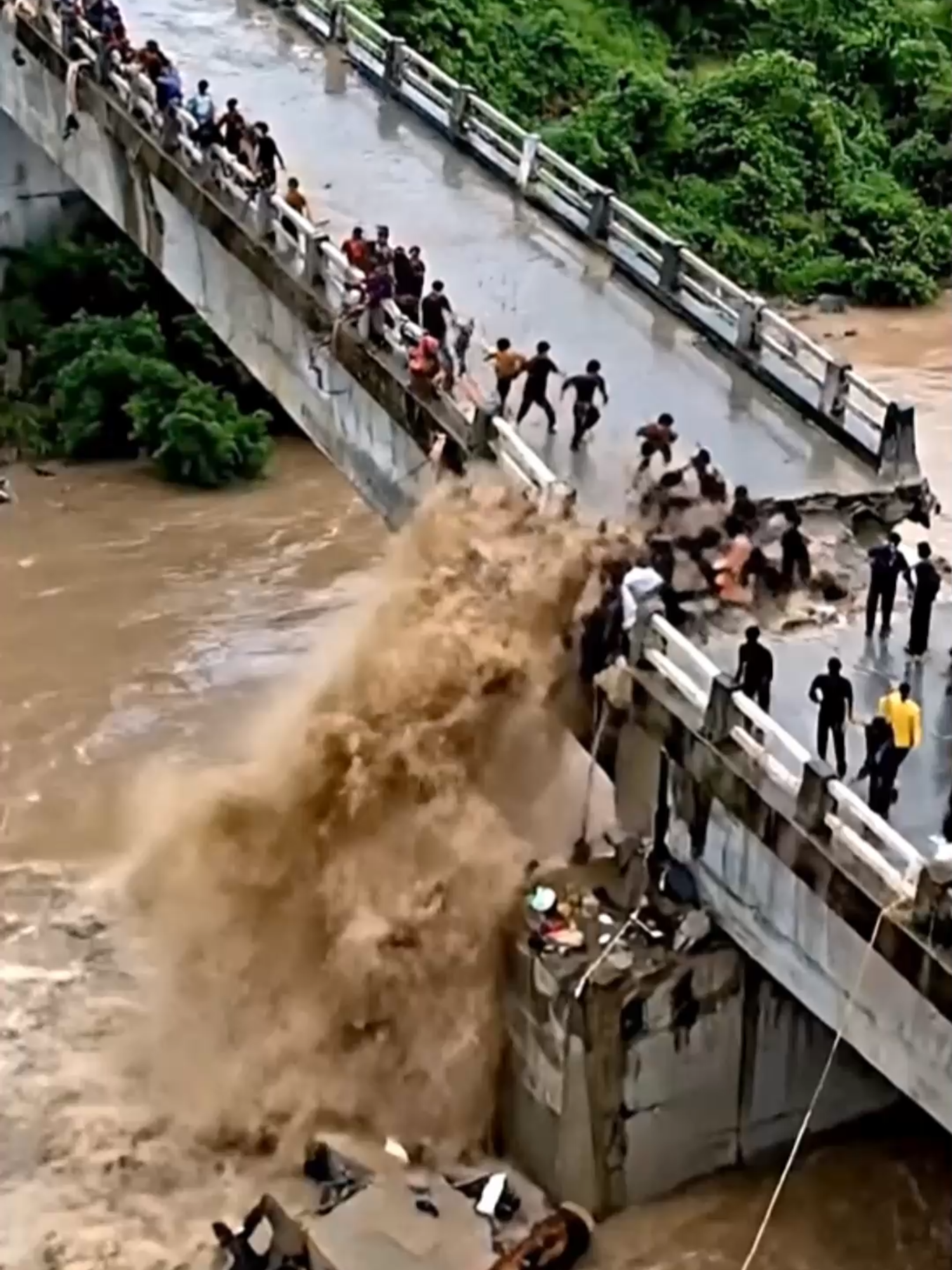 Moment the Bridge Almost Swept Away by Heavy Floods! #flood #disasterstrucks #fyp #viral