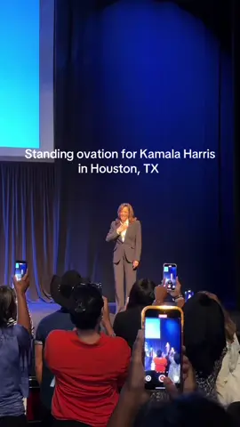 Kamala Harris receives enters to a standing ovation at the Houston, TX stop of her book tour 