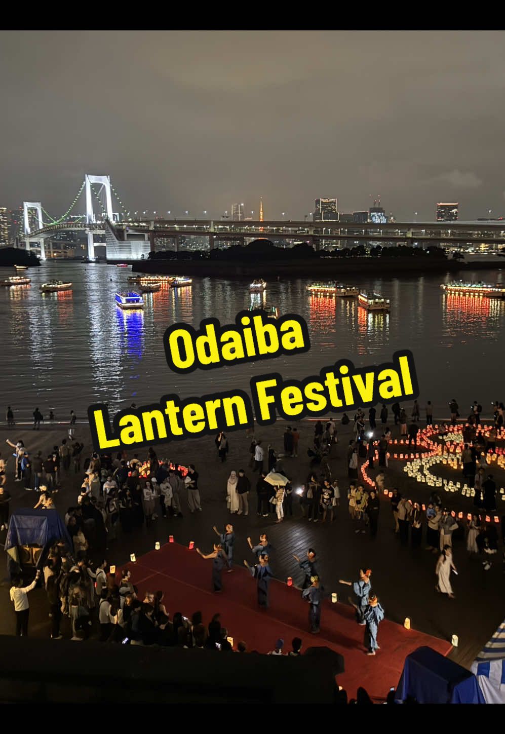 🏮 Odaiba Lantern Festival 🏮               (also called the Sea-Light Lantern / Sea Lamp / Sea Light Festival)           🌙 What Is It 	•	It’s an annual event held at Odaiba Marine Park / Odaiba Beach / Odaiba Seaside Park in Tokyo.   	•	The main spectacle involves arranging 10,000 to 20,000 paper lanterns along the beach, then lighting them by candlelight at dusk to form a large ground design (artistic motifs, shapes, etc.).   	•	Apart from the lanterns, there are also food/drink stalls, live performances (music, dance, etc.), and ambient evening time to stroll, enjoy views, etc.   ⸻ 📆 When & Where 	•	The 2025 edition: October 4-5, 2025   	•	Setup begins more in the afternoon; people start lighting candles in the evening (around sunset) and after sunset the lanterns really show up against the dark.   	•	Free to attend. No admission fee.   ⸻ ✨ What Makes It Special 	•	Visual artistry: The lanterns are arranged to create patterns/designs on the sand so when viewed together after dark, you can see geometric or thematic shapes.   	•	Scenic backdrop: The lanterns + the sound of waves + the Rainbow Bridge + boats (yakatabune) with their lights make for a very “postcard-Tokyo” kind of night.   ⸻ 🎴🗾💴🎎🍡🗻🇯🇵🍱🍣🍜 Odaiba (お台場) in Tokyo actually reminds one of a mix of several American cities rather than just one. But if we had to compare, here are the top contenders 👇 🇺🇸 1. San Francisco 	•	🏙️ The Rainbow Bridge in Odaiba is inspired by the Golden Gate Bridge — even the structure and lighting feel similar. 	•	🌉 The  atmosphere, with its waterfront views, skyline reflections, and sea breeze, gives that same “Bay Area” vibe. 	•	🚗 Plus, there’s a mini Statue of Liberty in Odaiba — which adds to the American, coastal feel. 🇺🇸 2. Los Angeles (Santa Monica/Venice Beach area) 	•	🏖️ Odaiba’s seaside park, shopping malls, and entertainment zones (like Aqua City and DiverCity) feel a lot like Santa Monica Pier or Venice Beach — colorful, modern, and lively. 	•	🌴 The palm trees, open boardwalks, and futuristic buildings all echo that California coastal lifestyle. 🇺🇸 3. Miami 	•	🌅 The combination of modern architecture, beachfront, and neon lighting at night can also feel a bit like Miami’s waterfront — especially when the Rainbow Bridge lights up at sunset. So overall: ✨ Odaiba = a mix of San Francisco’s bridge & skyline + LA’s entertainment vibe + Miami’s waterfront glam. #japanli#japanlifee#discoverjapana#destinationn#lanternfestivaln#trending