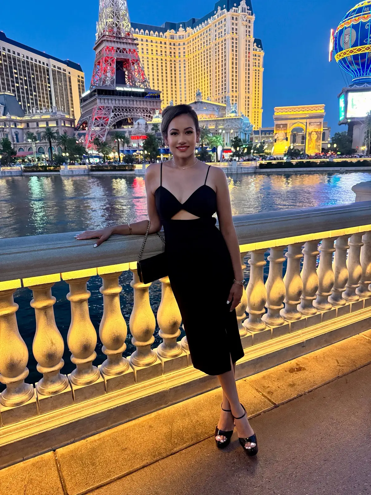 Stays photographed. 😉✨  Didn’t come to play — came to shine under the lights. 💋  Black dress, red soles, golden hour energy. 💫 #OOTN Hair: @Dyson USA Skin: @loréal paris usa @L’Oréal Paris  Lips: Infillable @L'Oreal Paris  Bag: @ChanelOfficial  Shoes: @Christian Louboutin  👠 Perfume: @Baccarat Rouge 540 #VegasNights #VivaLasVegas #MainCharacterEnergy #guyanesetiktok🇬🇾 