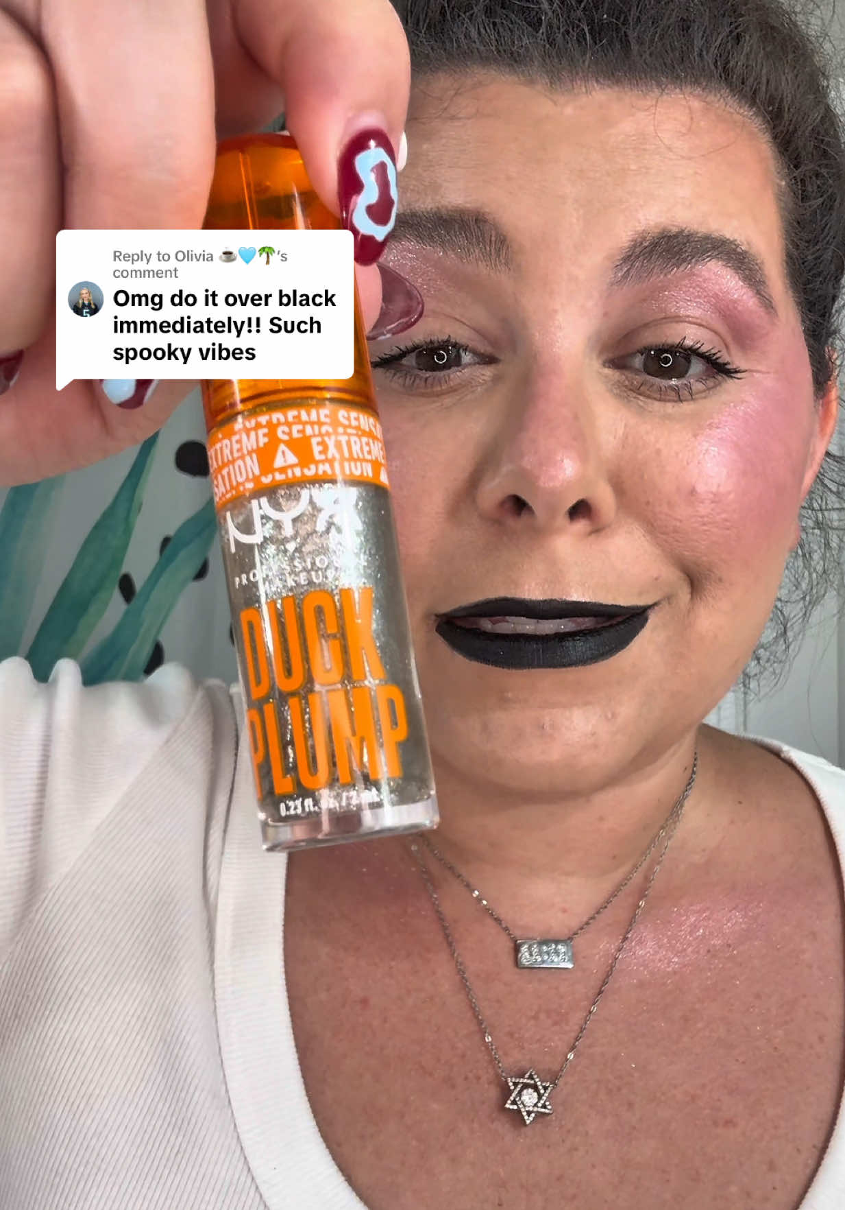 Replying to @Olivia ☕️🩵🌴  @NYX Professional Makeup Quazy Silver Duck Lip Plump over black is the spooky season lip of my dreams😍 what color do you want me to try next?! #nyxcosmetics #ducklips #blacklipstick #glittermakeup #tiktokshopfalldealsforyou 