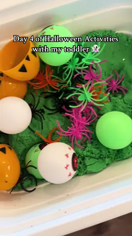 Spooky sensory bin 🫡 I found some spider rings, Halloween themed eggs, and spooky eyeballs to put in the sand! But of course, putting his monster trucks in was so much cooler! #halloween #toddlersoftiktok #sahm #31daysofhalloween 