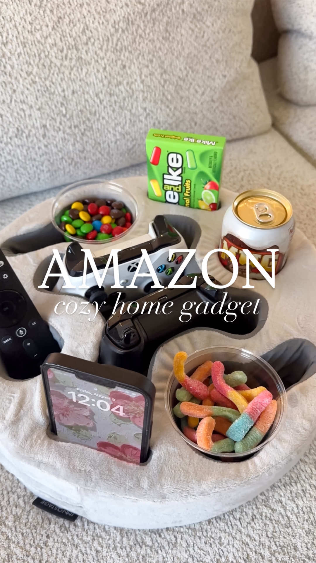 ✨Follow the link in our bio  ➡️ “AS SEEN IN VIDEOS 3” for the link to this couch cup holder pillow from Amazon! It is PERFECT for holding lots of different cup sizes/styles, video game and tv controllers, snacks and anything else you may need while lounging on the couch or bed! Makes the best gift too! 🙌🏻🧡 #asmr #thesistershoppers #amazonhome #amazonmusthaves #amazonfinds     @Amazon @Amazon Influencer Program 