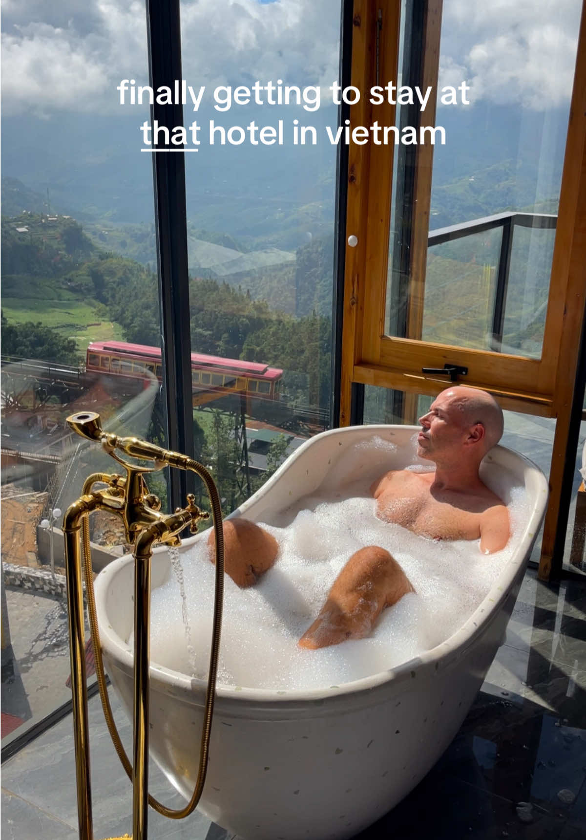 from saves album to real life the divine view from la do homestay really is all it’s cracked up to be. be cautious of the weather, though, as for a few days before my trip the weather was terrible and the view would have been awful (see a few videos before this one for the other special place i stayed).  sapa is like a fairytale town parts magical parts misty.  if you stay here you’ll likely become obsessed with listening out for the whirl of the tracks start indicating the funicular is on its way.  one of the most special places you’ll stay in vietnam. you can also just visit for coffee. oh, plus there are cats 🐈 🐈‍⬛  #sapa #vietnamtravel #hotelview 