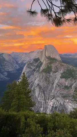 🇺🇸 As the sun descends, Glacier Point becomes a front-row seat to the greatest show on Earth.    The granite giants of Half Dome and Sentinel Rock ignite in a blaze of orange and pink.    The vast Yosemite Valley below is swallowed by deepening shadows, while the last light clings to the high peaks. A collective hush falls over the crowd—a moment of pure, shared awe.   This is not just a view; it's a profound experience that etches itself into your memory forever. #USA #Yosemite #nature #mountains #travel