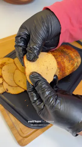 Let me show you how to make your own chicken ham at home — the easy way! Soft, smoky, and perfect for sandwiches, wraps, or breakfast plates. 💛 You’ll need: 	•	500g boneless chicken breast or thigh 	•	1 teaspoon salt 	•	½ teaspoon sugar 	•	½ teaspoon garlic powder 	•	½ teaspoon onion powder 	•	½ teaspoon black pepper 	•	½ teaspoon paprika (plus extra for sprinkling) 	•	1 tablespoon cornstarch or tapioca starch (to bind) 	•	1 tablespoon oil 	•	2–3 tablespoons ice-cold water or milk 	•	Optional: ½ teaspoon liquid smoke or a pinch of smoked paprika (for that deli aroma) How to: Add everything into your @Buchymix food processor and blend till smooth and sticky. Spread cling film, shape it into a log, sprinkle a little paprika on top. Roll tightly, wrap again in foil. Steam for 45–60 minutes. Let it cool completely before slicing — that’s when it firms up beautifully. Soft, juicy, and full of flavor.  Enjoy it with: Bread, eggs, salads, or pasta — it goes with almost anything! #fyp #foryou #viral #homemadeham 
