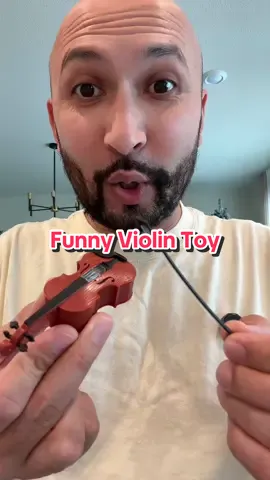 This tiny violin 🎻 cute and annoying at the same time #tinyviolin #funnyviolin #toys #christmasgiftideas #funnytoys 