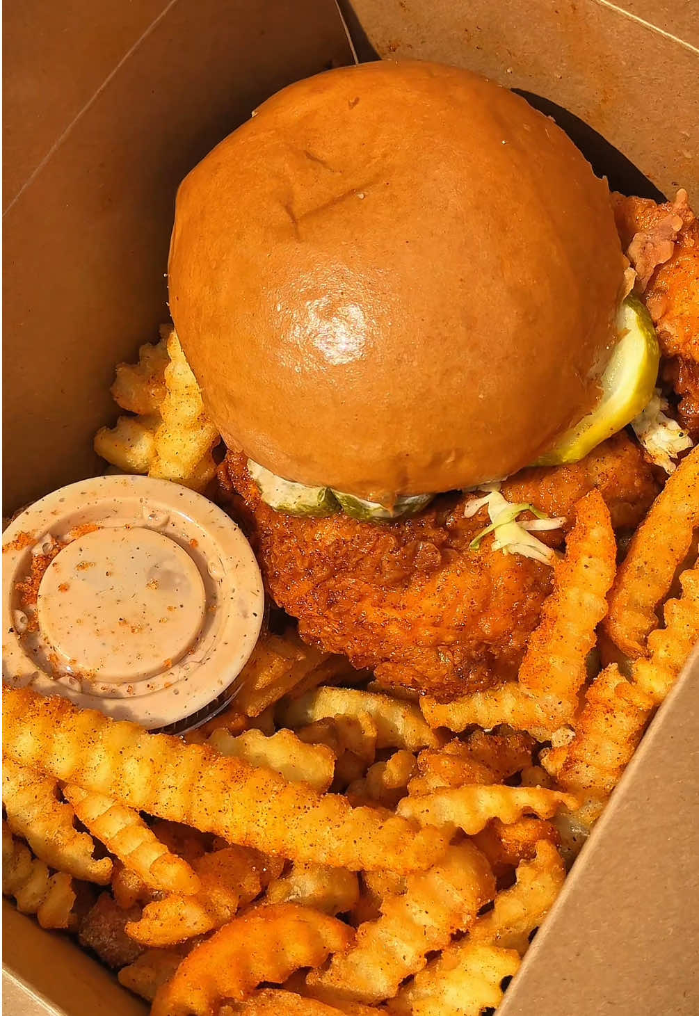 Chicken Mega Slider 🔥 Crispy tender on brioche, topped with coleslaw, pickles, and soul sauce 😋 Nothing but flavor in every bite. 📍2425 E Colonial Dr, Orlando, FL 32803 🕚 Wed–Sun | 11AM–9PM #friedchicken #orlandofoodie #crispychicken #orlandofl #FoodTok     
