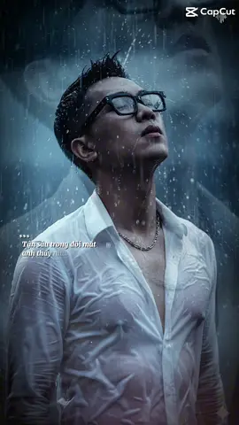 Bước1 vào gemini Bước 2 gõ lệnh:Create an image A stylish model standing in heavy rain, soaked and expressive, wearing a semi-wet white dress shirt with subtle transparency, artistically clinging to his form. He looks upward with a cinematic, emotional expression. Rain droplets suspended midair, dramatic lighting with cool blue tones, soft mist in the background, shallow depth of field. Editorial fashion shoot style, aesthetics, captured in ultra-high resolutionRatio 3:4 Note: use facial description from the uploaded image 100% #manhtinhsaidoi #gemini #capcut #foryoupage #trendingsong 