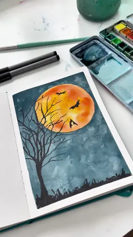 Supplies are my brand and are on my page https://www.adreamoradayart.com/ Supplies used: 24 color essential palette Watercolor sketchbook Size 8 round brush Artist pens Artist tape Paper towel and something round to trace When you make your tree, hold the pen loosely and kind of trust it. That will help you make branches that look more organic and spooky! #sketchbookideas #easyart