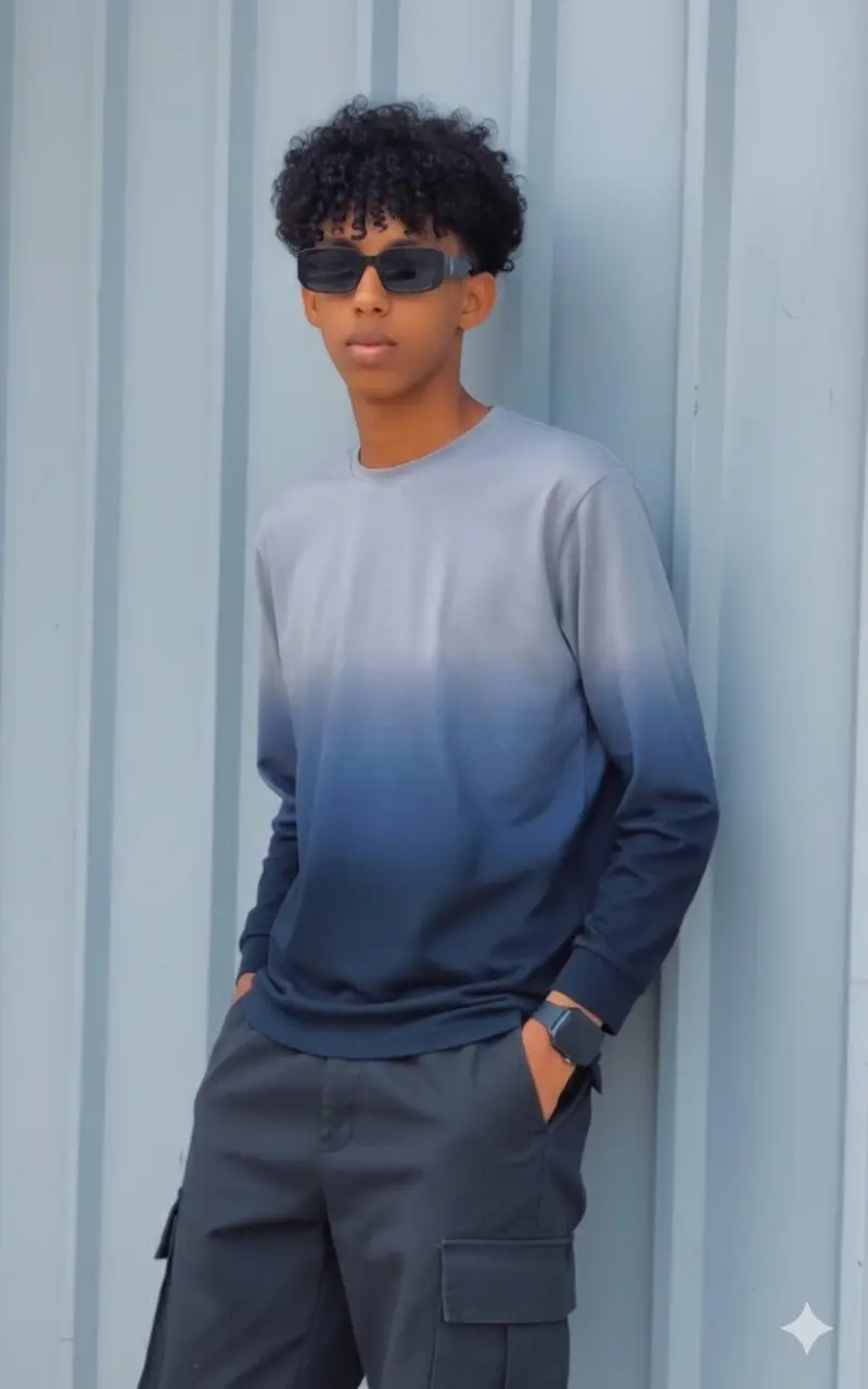 #viraltiktok  #Gimini  #viralvideo  a stylish young man with dark messy hair and sunglasses leaning casually against A light gray paneled wall he is wearing an that transitions from dark blue to light gray in an omber effect and dark cargo pants his hands are in his pockets and he has a dark watch in his left wrist tha lighting is bright and even highlighting tha taxtures of his colthing and hair use tha 100%same face as I uploaded