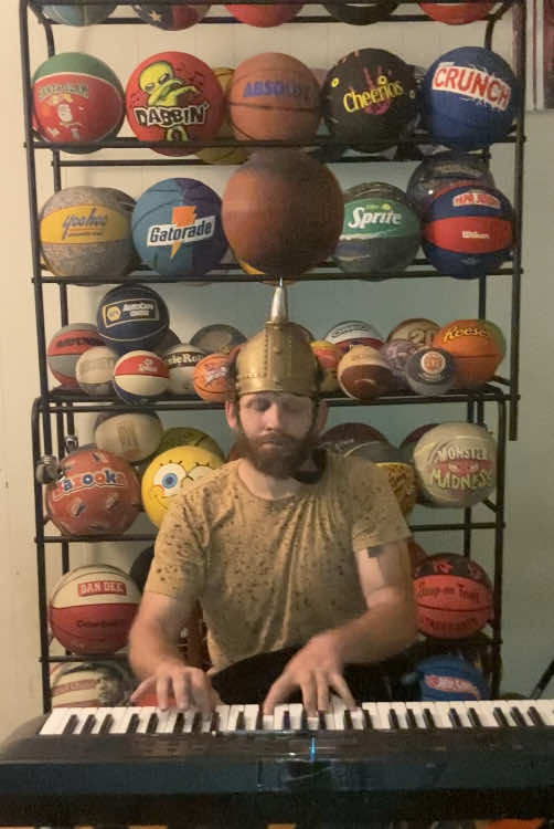 Playing an original song on keyboard with a basketball spinning over my head and a cat on my lap 🏀🎹🐈‍⬛ #original #fyp #trick #keyboard #basketball