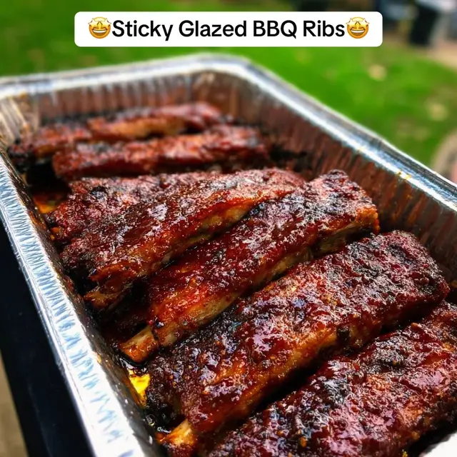 Sticky Glazed BBQ Ribs Ingredients: 2 racks pork ribs 2 tbsp olive oil 3 tbsp brown sugar 2 tbsp smoked paprika 1 tbsp garlic powder 1 tbsp onion powder 1 tsp cayenne pepper 2 tsp salt 1 tsp black pepper 1 cup BBQ sauce ¼ cup honey 2 tbsp apple cider vinegar Instructions: 1. Preheat smoker or oven to 275°F (135°C). 2. Remove membrane from back of ribs and pat dry with paper towels. 3. Rub ribs with olive oil, then coat evenly with spice mix (brown sugar, paprika, garlic, onion, cayenne, salt, pepper). 4. Place ribs on smoker or baking sheet with rack; cook for 2½–3 hours until tender. 5. Mix BBQ sauce, honey, and vinegar in a bowl. Brush mixture over ribs. 6. Return ribs to smoker/oven and cook another 30–45 minutes until glaze is sticky and caramelized. 7. Rest 10 minutes before slicing and serving. #StickyGlazedBBQRibs #fyp #earthangel #foryou #repost #recipeladygang #recipady1111 #share #cookingrecipes #recipesforyou #recipelady #recipesoftiktok #comfortfood #bbqrecipe 