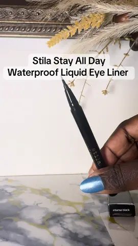 Stila Stay All Day® Waterproof Liquid Eye Liner truly lives up to its name, smooth application, intense pigment, and all-day wear without smudging or fading.  Perfect for creating anything from subtle lines to bold wings, it’s a makeup bag essential.🖤 #StilaStayAllDay #LiquidEyeliner #MakeupMustHave #SmudgeProof #WaterproofEyeliner   
