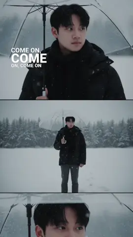 PROMPT GEMINI: Three-frame cinematic photoshoot of a young man in snowy winter field, holding a transparent umbrella. Style: realistic, cinematic, melancholic mood, soft cold lighting, falling snow. Outfit: short black hair, black scarf, dark padded puffer jacket, grey trousers. Frame 1 (top): close-up portrait, under umbrella, looking to the side, thoughtful expression. Frame 2 (middle): full-body shot, standing in snowy field, holding umbrella above head, facing camera, snow-covered trees in background. Frame 3 (bottom): extreme close-up of face, under umbrella, focus on eyes and lips with snowflakes. Same composition and layout as reference photo. #viral #gemini #ai #prompt #xuhuong 