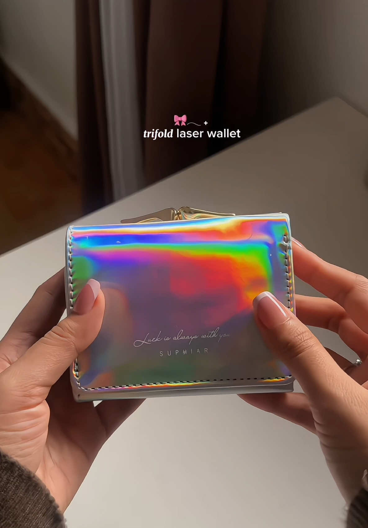 this trifold laser wallet! 👀🎀𓂃 ࣪˖  #wallet #walletforwomen #trifoldwallet #wallettok #walletrecommendation  