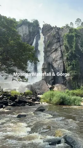 Kitagwenda’s Mpanga Gorge with cycards and beautiful waterfall