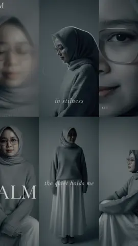 Don't change the face in the reference, it must be 100% identical to her. Edit the reference photo into a six-panel vertical portrait collage of the same Indonesian hijabi woman. Overall vibe: cool analog film aesthetic, muted blue-gray tones, subtle grain, serene and quiet mood. Background: soft gray-to-pale blue gradient backdrop, slightly textured like old film stock. Hijab: lightweight linen hijab in pale gray, draped naturally with soft folds. 2/4 Outfit: oversized knitted sweater in cool light gray, paired with flowing skirt in misty white. Barefoot or simple soft flats. --- Panel 1 (Top Left): Close-up portrait, eyes closed gently, soft light across her cheek. Foreground blur like frosted glass. Text: faded serif “CALM” in the corner. Panel 2 (Top Center): Profile pose, head slightly bowed, cool backlight wrapping softly around her silhouette. Overlay: handwritten “in stillness”. Panel 3 (Top Right): Extreme close-up of one eye,3/4 cool shadows framing it, film grain visible. Typography: minimal small “CALM” at the bottom edge. Panel 4 (Bottom Left, larger): Seated close-up, sweater sleeves pulled over hands, gaze soft into the camera, aura quiet and intimate. Overlay: large serif “CALM” semi-transparent across the sweater. Panel 5 (Bottom Center): 3/4 body pose, standing still, skirt draping downward, expression serene. Text: typewriter font “the quiet holds me”. Panel 6 (Bottom Right): Seated sideways, head tilted slightly upward, eyes half-closed as if listening to silence. Subtle vignette. Typography: thin serif “CALM” vertically aligned at the edge.