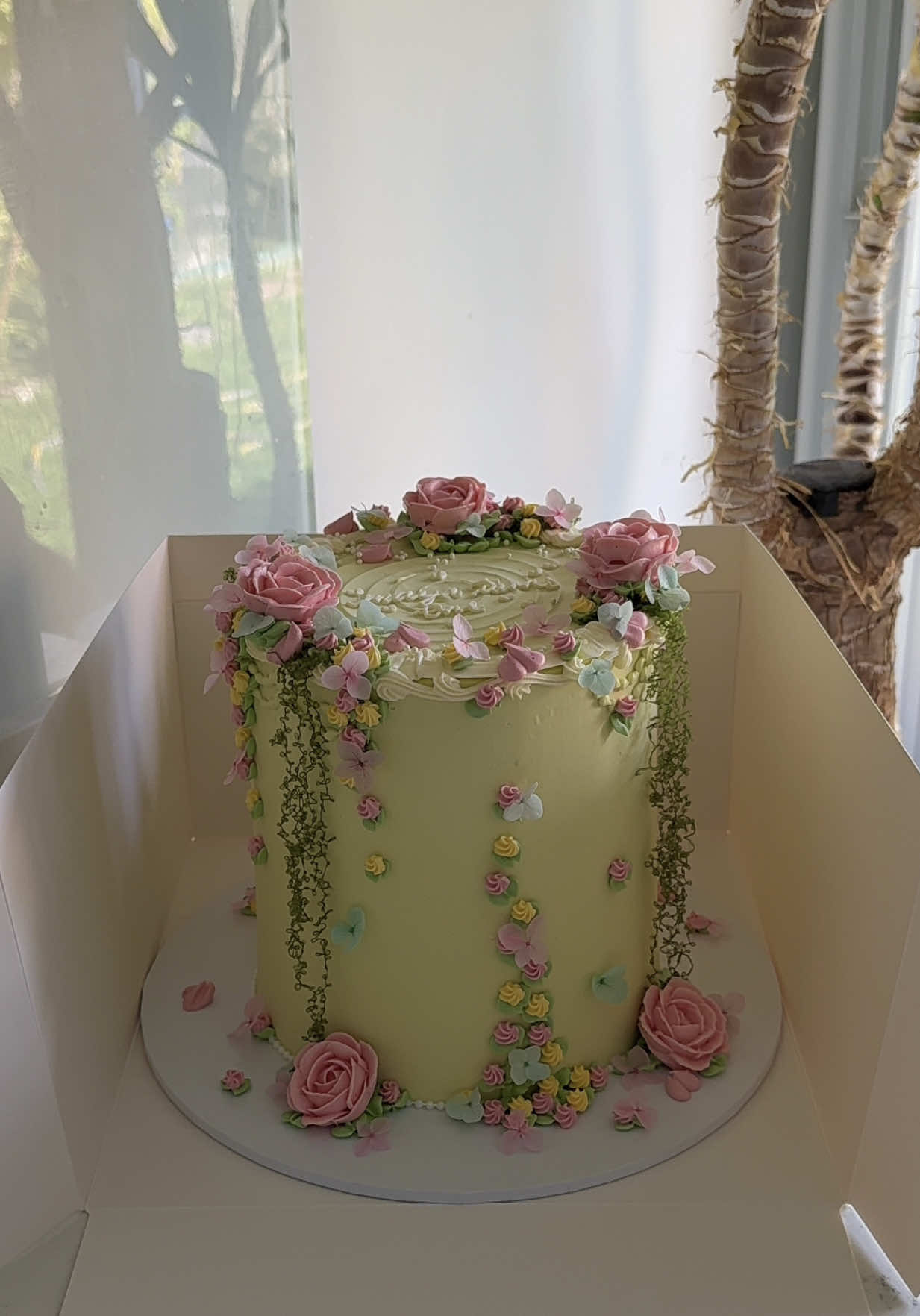 I had the pleasure of creating the MOST BEAUTIFUL first birthday cake for a very special little girl🥹💚💕🌸🌷🌱✨ #floralcake #vintagecakes #fyp #buttercreamcakes 