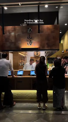 This standing sushi bar in Toranomon Hills, Tokyo was INSANE! The scallops & medium fatty tuna I will think about forever. 🍣 #tokyojapan #japantravel #tokyorecommendations #tokyoitinerary #toranomonhills 