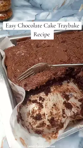 Easy Chocolate Cake Traybake Recipe  Ingredients: 1 cup cake flour  1 teaspoon baking powder  ½ teaspoon bicarbonate of soda  ¼ teaspoon salt ¾ cup sugar  1 large egg ⅓ cup oil ½ cup buttermilk  ¼ cup cocoa powder  1 teaspoon coffee granules  ½ cup boiling water  Ganache Ingredients: 200g chopped chopped/chocolate chips  ⅔ cup fresh cream  Note:to make buttermilk at home put ½ tablespoon vinegar in ½ cup milk .#Recipe #chocolate #cake 
