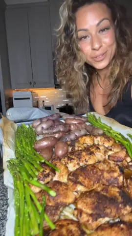 🔥 Wood-Fired Garlic Sheet Pan Dinner #woodfiredgarlic #sheetpandinnwr #Recipe #familydinner #EasyRecipe  Another quick and easy family dinner — she’s cute, she’s green, the whole family loves her. She will make your pee stink though. 😏 What I used: 	•	4 lbs boneless, skinless chicken thighs 	•	Kinder’s Wood-Fired Garlic seasoning 	•	Salt & pepper 	•	2 tbsp butter 	•	12 oz purple fingerling potatoes (Target) 	•	1 bunch asparagus (ends trimmed) 	•	Olive oil spray What I did: 	1.	Lined a baking sheet with parchment paper. 	2.	Seasoned both sides of the chicken with Kinder’s Wood-Fired Garlic, salt, and pepper. 	3.	In a skillet, melted 2 tbsp butter and seared the chicken on both sides for color (don’t cook through). 	4.	Arranged the chicken on the sheet pan. 	5.	Added the purple fingerling potatoes (poked a few holes) to the pan. 	6.	Baked at 425°F for 15 minutes. 	7.	Pulled it out, added the asparagus (olive oil spray, salt, pepper). 	8.	Back in for 10 more minutes, and done. Juicy chicken, crispy potatoes, perfectly tender asparagus — all in one pan, zero drama.