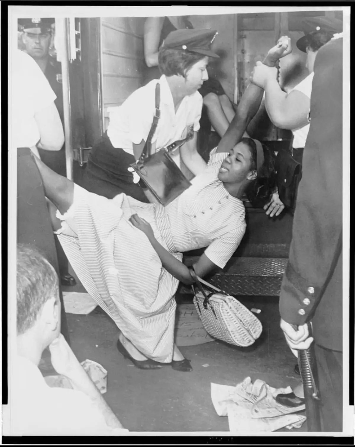 Juanita Sealy is carried to a police patrol wagon after an attempt at a sit in, Brooklyn, New York, 1963 #blackhistoryfacts  #fyp  #fyppp  #fypシ゚viral 
