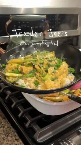 This was the easiest meal I’ve made all year and it was SO delicious! I made a couple of adjustments that I think took it to a 10 🙌  Viral Trader Joe’s dumpling bake: Combine the whites (+ light greens) of a bunch of green onions w/ minced garlic, a bottle of TJ’s red curry sauce, a can on coconut milk, and 1/3 cup TJ’s soyaki sauce. Lay down a good handful of spinach and some baby bok choy. I used almost two full bags of Trader Joe’s frozen gyoza for the top. Cover and bake at 400 for 35 min. Serve over rice, top with green onion, and enjoy!  #traderjoesdinner #traderjoesmeals #traderjoesmusthaves #weeknightdinner #weeknightmeals  