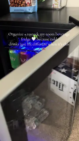 Fridge right where I need it 🙌🏾 Close enough to grab a cold drink or snack 🍺🥤My organized beverage fridge is perfect and i love the blue light vibes 😌👌🏾  #fridgeorganization #TikTokShopFallDealsForYou #tiktokshopcreatorpicks #beveragecooler #organizedhome 