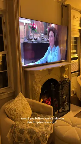 So proud of this DIY fireplace project! 🪵🕯️    Comment below or message me for the links to the pillars, peel-and-stick tiles, electric fireplace insert/heater, and gate! 💌       #nyc #diyproject #fauxfireplace #diyfireplace #interiordesign 