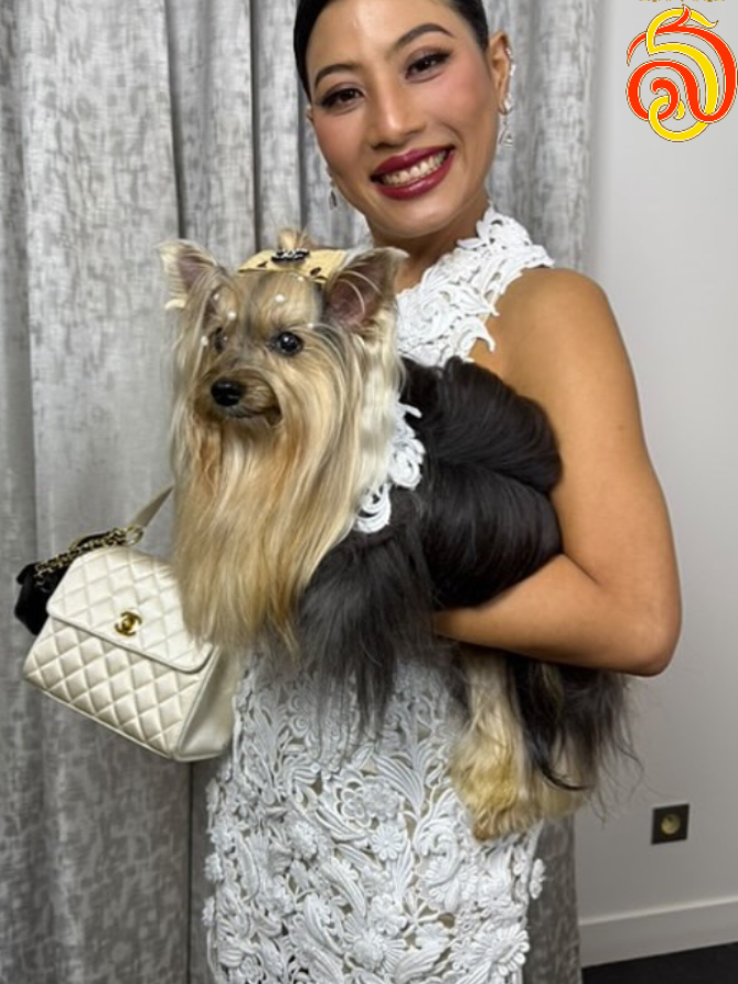 HRH Princess Sirivannavari with her beloved yorkie 