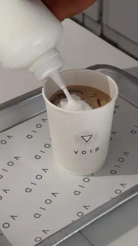 pov: you just unlocked your newest obsession: dirty void ☕️✨ #coffeelover #abudhabi #voidcafe #dirtyespresso #coffee 