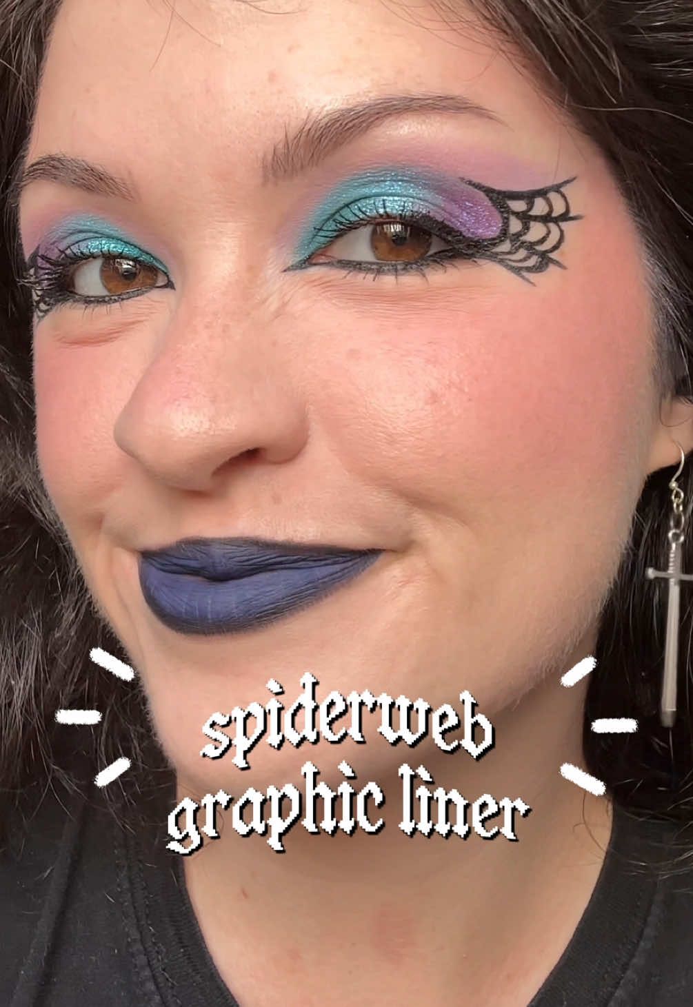 all you need is a liner pen and some patience!👻 Tag me if you try spiderweb graphic liner!🫶🏻 @ColourPop Cosmetics bff liquid liner “numero uno” and Haunted Mansion eyeshadow palette 🗡️earrings are @Kikay Earrings & Accessories  *makeup and earrings were kindly gifted without requirement to post!🫶🏻 #graphicliner #spiderwebmakeup #halloweenmakeup #colourpopme 