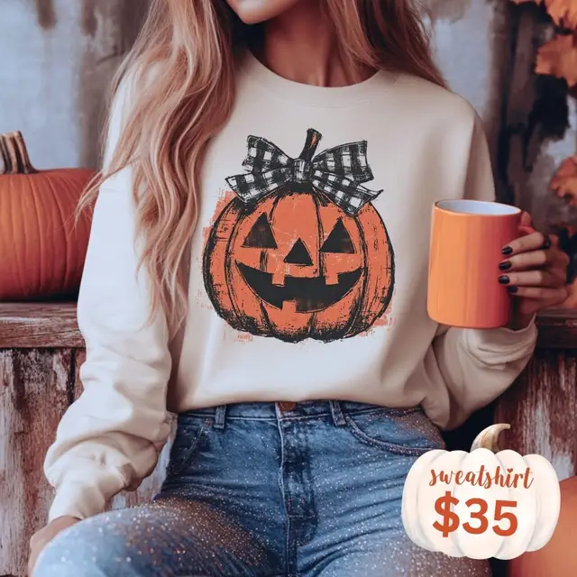 This pumpkin with a bow?? I’m obsessed 🎀🎃 Perfect for coffee runs, pumpkin patches & all the spooky cute vibes 💕 #halloweenvibes #pumpkinseason #sparkleandco Available on: SPARKLEANDCO.com under CURRENT PROMOS 🧡