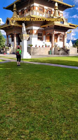 KHAMSUM YUELLEY NAMGYEL Location: Nestled atop a lush hill overlooking the serene Punakha Valley, the Khamsum Yuelley Namgyel Chorten is more than just a stunning stupa -it’s a place where spirituality, nature, and human devotion intertwine.  How to reach?  Imagine a quiet escape, just a 30-minute scenic drive from Khuruthang town, followed by a peaceful 45-minute hike through terraced fields and pine forests. The journey itself feels like a gentle unwinding, leading you to a spot that seems to hold the valley in its embrace.   Patron (who built it): This architectural marvel wasn’t born from mere tradition alone. In 2004, Her Majesty the Queen Mother Azhi Tshering Yangdon, driven by a mother’s love and a leader’s vision, commissioned its creation as per the prophecy of Lama Sonam Zangpo. Walking around the chorten, you can almost feel that intention lingering in the air -a quiet hum of goodwill for all living beings.   Bartsham Lama Kunzang Wangdi, popularly known as Lama Nyingkula, a prominent disciple of Dudjom Rinpoche, ensuring adherence to sacred Vajrayana Buddhist principles. Relics: Inside the Chorten, the decor is lavish, featuring detailed murals and statues. These figures depict various deities and personalities from Vajrayana Buddhism, aimed at fostering peace, harmony, and protection. Notable elements include: Wrathful Deities:   The statues of wrathful deities are prominently featured, representing the fierce compassion necessary to overcome challenges and safeguard the Dharma. They are meticulously crafted, vibrantly painted, and meant to evoke feelings of awe and reverence. On the ground floor, the assembly of deities of the Vajrakilaya of Meteoric Iron (Namchak Pu Dri), which conquers the demon of the lower realms. On the first floor, the assembly of deities of the Vajrakilaya of the Razor-like Cutting of Karma (Regpung). On the second floor, the assembly of deities of the Five Families of Vajrakilaya (Kilaya Rig Nga).  Although these are essentially one and the same Vajrakilaya deity, they are displayed separately to tame beings according to their needs. Buddhas and Bodhisattvas:   Statue of Buddha on top of the stupa is believed to be spoken-Buddha including other celestial figures, are present to bestow blessings of wisdom and tranquility. The shrine for the local deity is also housed inside. Guardian Kings:   These protectors are typically depicted in stupas and temples, symbolizing protection in the four cardinal directions. Their presence is meant to dispel negative energies and maintain the purity of the site. The Symbolism of the Statues:   The arrangement and representation of the statues hold profound symbolism, reflecting Buddhist teachings. They embody traits like wisdom, compassion, and strength. Each level of the chorten signifies different aspects of spiritual development, with the statues serving as crucial resources for guiding practitioners. Importance of the Chorten:   Khamsum Yuelley Namgyel Chorten was built to serve as a shield for Bhutan and the world, advocating peace and abundance. The statues within are not merely objects of worship, but also serve as educational tools, illustrating essential principles of Bhutanese Vajrayana Buddhism. Visitors are encouraged to delve into the spiritual significance embedded in the art and architecture, making the chorten a vibrant representation of Bhutan’s religious heritage. Conclusion:  Whether you’re drawn by faith, history, or the promise of panoramic views of the Mo Chhu River snaking through golden fields, the Khamsum Yuelley Namgyel Chorten doesn’t just impress -it resonates. It’s a reminder of how human hands, guided by compassion, can craft something timeless. Come for the hike, stay for the peace, and leave with a little more light in your heart. #500kviews #buddhism #goodvibes💕 #bhutanbelieve #creatorsearchinsights2025 