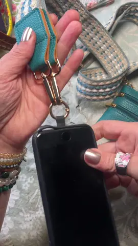 Clip and go crossbody strap for traveling hands free with your phone, wear your phone around your neck as a lanyard, also has a small wallet change purse for money, cards, adjustable strap #tiktokshop #tiktokshopcreatorpicks #fashion #convenient #travel 