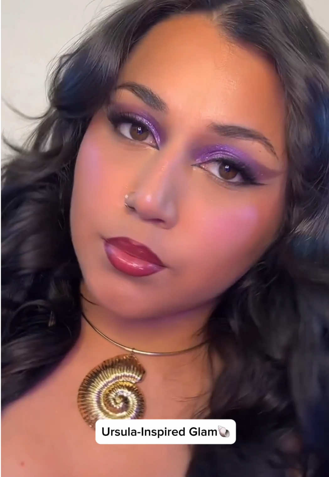 @gabysglam⁠ is making waves with this look inspired by Disney's Ursula 🌊💜🐚⁠ ⁠ Featuring: ⁠ ⁠💜 Fiery Femmes Eye & Face Palette in Beautiful Destroyer⁠ 😏 Extreme Evil Jelly Blush in Blah Blah⁠ ✨ Bad Rep Jelly Highlighter in Infamous ⁠ 🐚 Pick Your Vice Plumping Lip Gloss in Totally Twisted⁠ ⁠ Shop the wet n wild Disney Villains collection NOW @walmart (online & in-store) @walgreens ⁠Coming soon to @ultabeauty (online only) @amazon & wetnwildbeauty.com